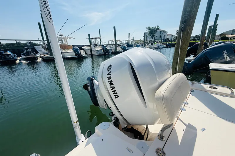Slide: The Image of 2021 Grady-White 251 Coastal Explorer with Yamaha engine docked at marina. - 8