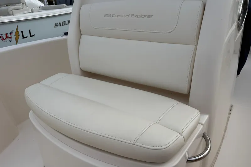 Slide: The Image of 2021 Grady-White 251 Coastal Explorer boat seat, white upholstery, sleek design. - 15