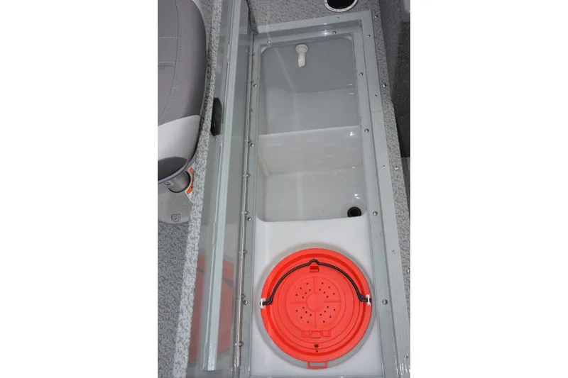 Slide: The Image of Manufacturer Provided Image: 2022 Starcraft Stealth 166 SC livewell compartment with red lid. - 13