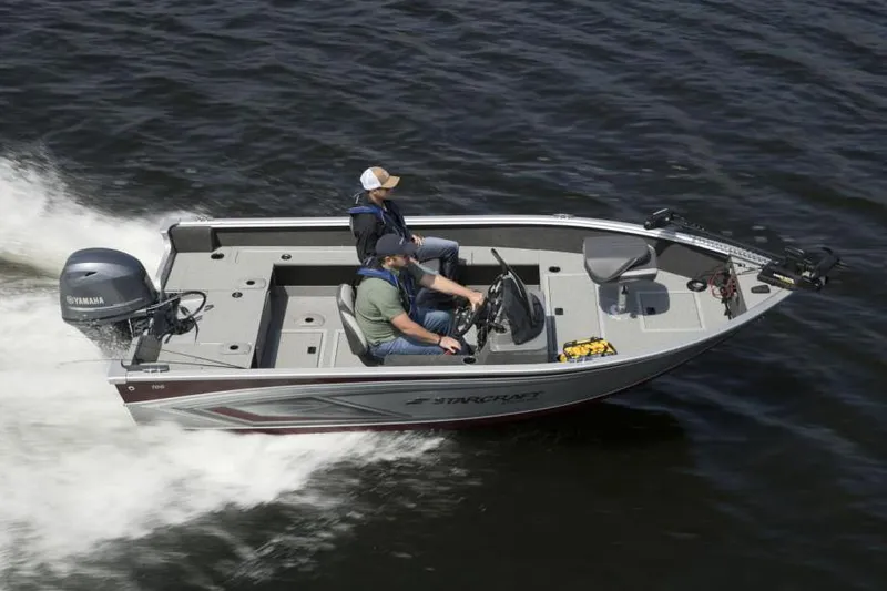 Slide: The Image of Manufacturer Provided Image: 2022 Starcraft Stealth 166 SC boat cruising on water with two passengers. - 3