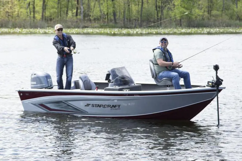 Slide: The Image of Manufacturer Provided Image: 2022 Starcraft Stealth 166 SC boat with two people fishing on a lake. - 7