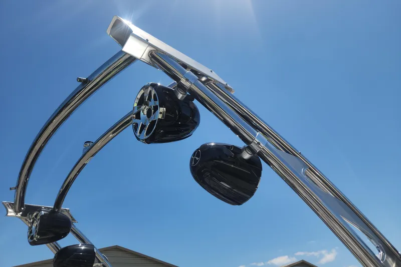 Slide: The Image of 2015 MB SPORTS F22 Tomcat wakeboard tower speakers under clear blue sky. - 6