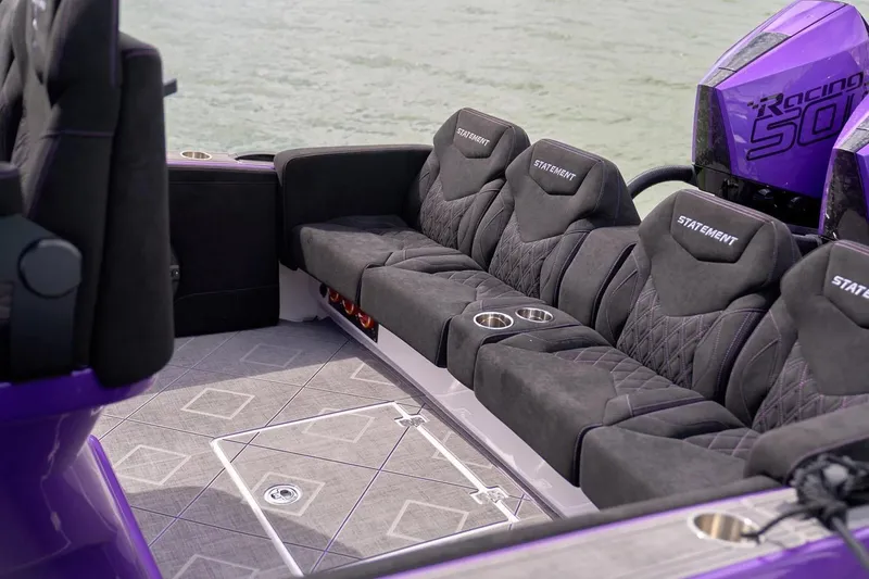 Slide: The Image of Manufacturer Provided Image: Luxurious seating on 2026 Statement 380 Open boat with purple accents and Racing 500 engine. - 5