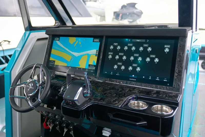 Slide: The Image of Manufacturer Provided Image: Cockpit of 2025 Statement 430 Tigress with advanced navigation and control systems. - 4