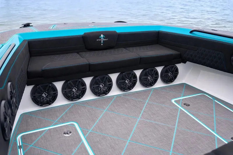 Slide: The Image of Manufacturer Provided Image: Luxurious interior of 2025 Statement 430 Tigress boat with stylish seating and premium speakers. - 10