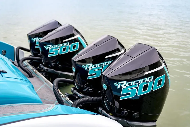 Slide: The Image of Manufacturer Provided Image: Four powerful Racing 500 outboard engines on a 2025 Statement 430 Tigress boat. - 11