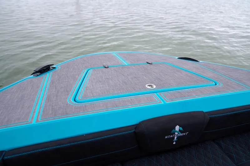Slide: The Image of Manufacturer Provided Image: Bow of 2025 Statement 430 Tigress boat with sleek design on calm water. - 3