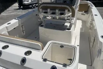 Slide: The Image of 2023 Trophy T24 CC boat interior with seating and storage compartments. - 7