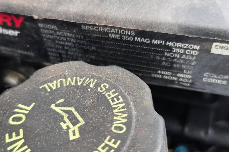 Slide: The Image of Close-up of a 1974 Chris-Craft 22 Tournament Fisherman engine specifications label. - 27