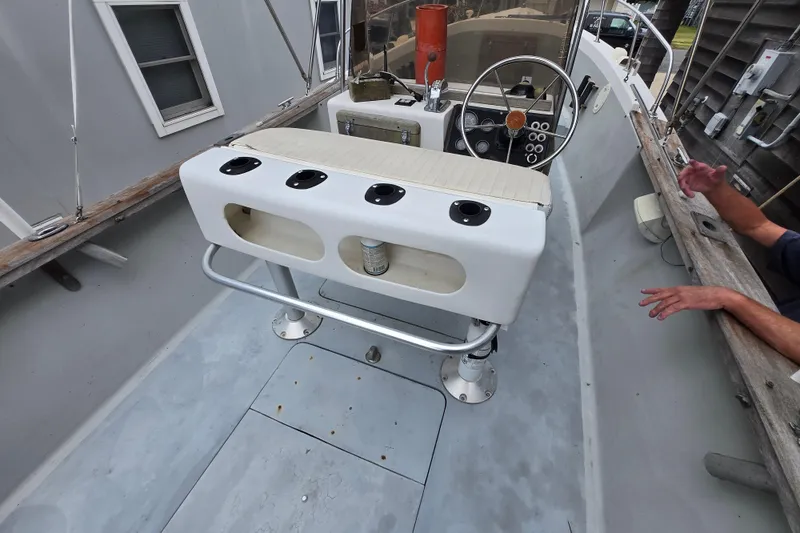 Slide: The Image of 1974 Chris-Craft 22 Tournament Fisherman boat interior with steering wheel and control panel. - 21