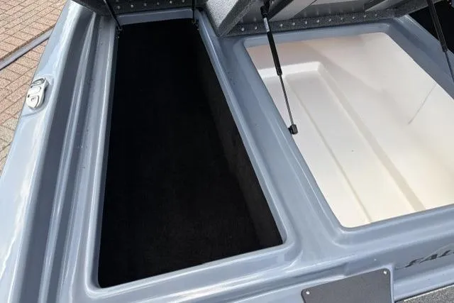 Slide: The Image of Open storage compartments on a 2025 Falcon Boats F-18, showcasing spacious interior design. - 8