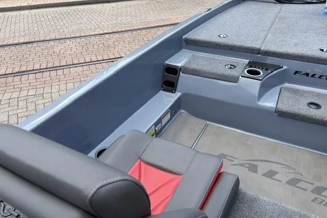 Slide: The Image of Interior of 2025 Falcon Boats F-18, featuring seating and storage compartments. - 3