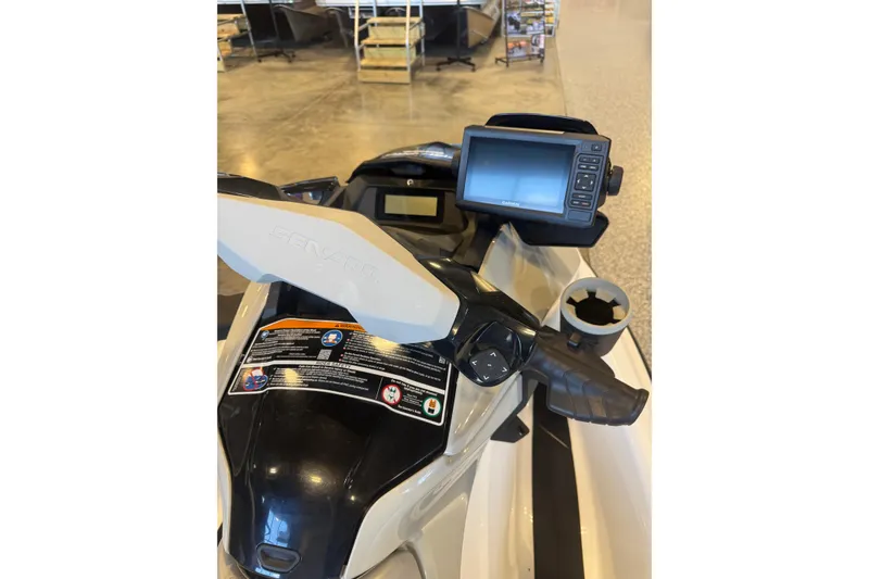 Slide: The Image of 2022 Seadoo FishPro dashboard with navigation system and controls in showroom. - 4