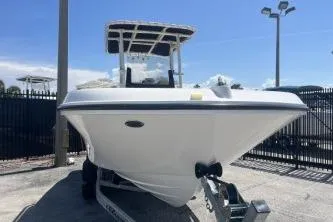 Slide: The Image of 2022 Trophy T20 boat on trailer under clear blue sky. - 3