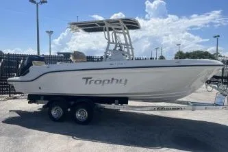 The Image of 2022 Trophy T20 boat on trailer, parked outdoors under a clear sky. - 1