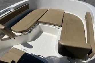 Slide: The Image of 2022 Trophy T20 boat interior with beige seating and white deck. - 10