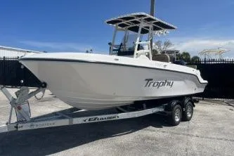 Slide: The Image of 2022 Trophy T20 boat on trailer, white hull, outdoor setting. - 4