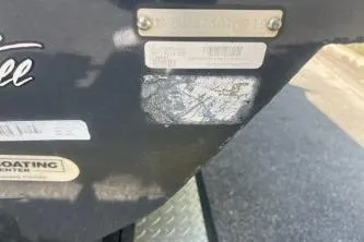 Slide: The Image of 2019 Tracker Pro Team 190 TX boat with identification plates and labels. - 10
