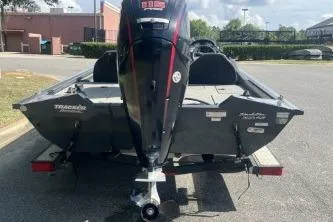 Slide: The Image of 2019 Tracker Pro Team 190 TX boat on trailer, rear view in parking lot. - 4