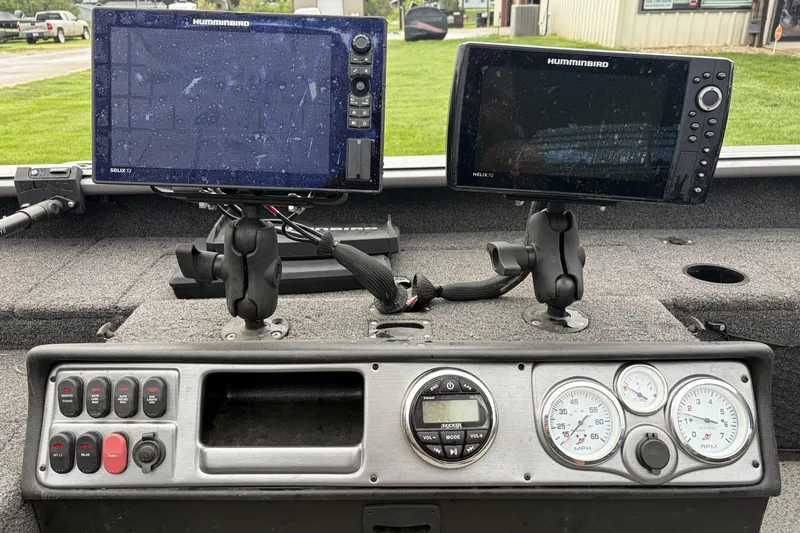 Slide: The Image of Dashboard of 2024 Lund 1875 Pro Guide boat with Humminbird electronics and gauges. - 4