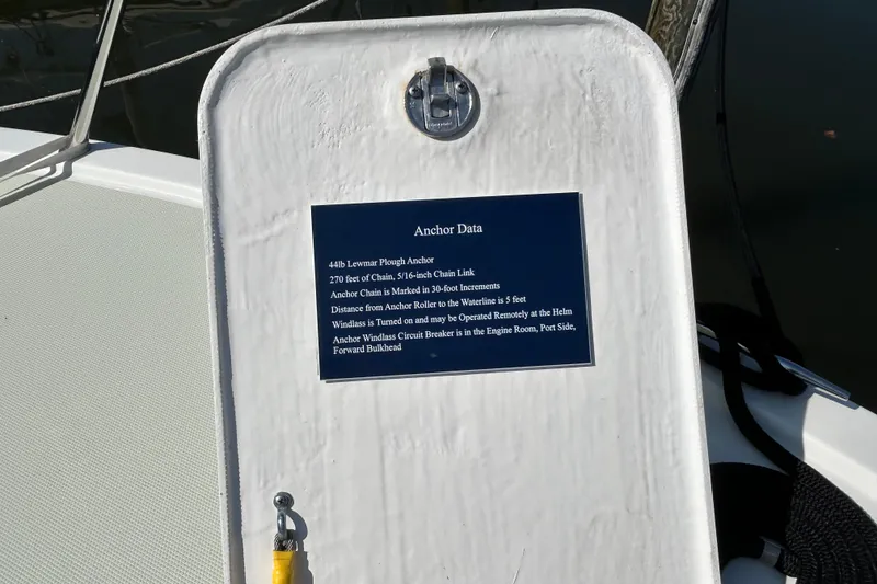 Slide: The Image of Plaque displaying anchor data on a 2016 Back Cove 34 boat deck. - 14