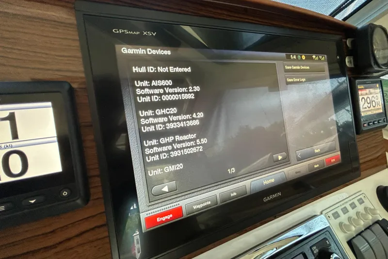Slide: The Image of Garmin GPS display on 2016 Back Cove 34 boat, showing software versions and unit IDs. - 47