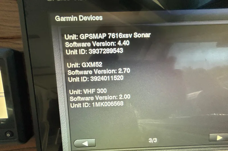 Slide: The Image of Garmin device display on 2016 Back Cove 34, showing software versions and unit IDs. - 44