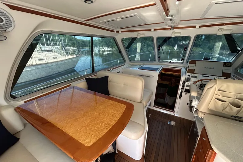 Slide: The Image of Interior of 2016 Back Cove 34 yacht with elegant seating and navigation equipment. - 35