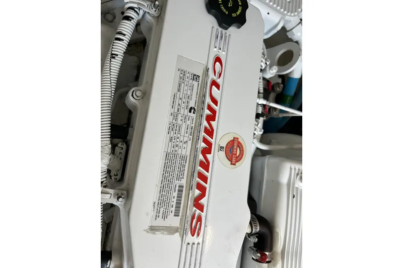 Slide: The Image of Cummins engine in a 2016 Back Cove 34 boat, showcasing detailed specifications. - 27