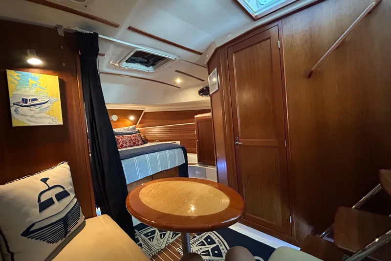 Slide: The Image of Luxurious interior of 2016 Back Cove 34 yacht with cozy seating and elegant wood finishes. - 56