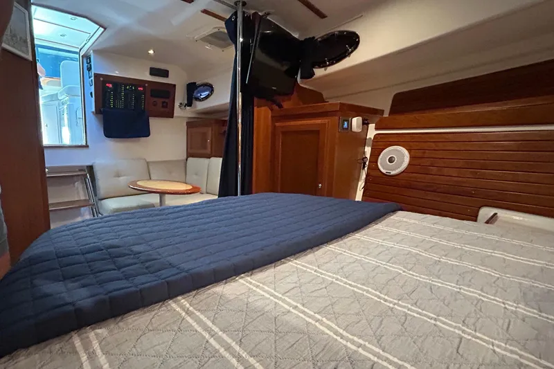 Slide: The Image of Interior of 2016 Back Cove 34 yacht with cozy seating and elegant wood finishes. - 57