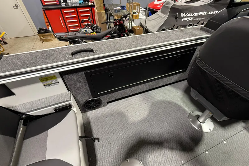 Slide: The Image of 2025 G3 Angler V1850 SF boat interior with seating and storage compartments. - 11