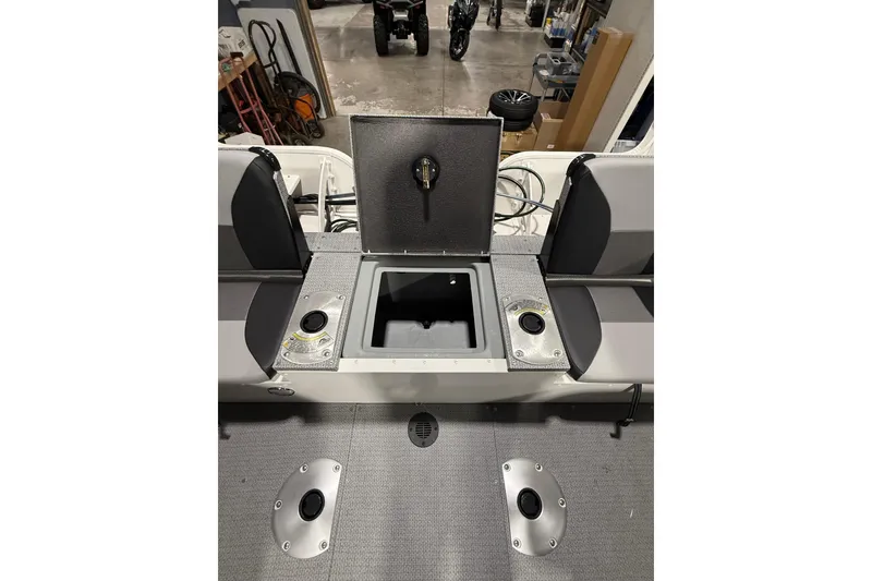 Slide: The Image of 2025 G3 Angler V1850 SF boat interior with storage compartment open. - 7