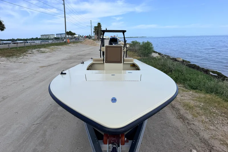 Slide: The Image of 2025 Hell's Bay Professional boat on a coastal road, showcasing sleek design and craftsmanship. - 4