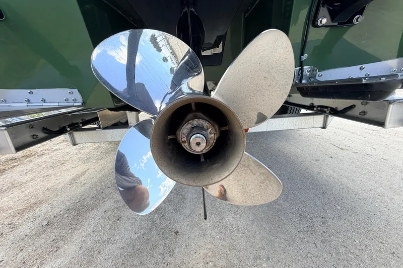 Slide: The Image of 2025 Hell's Bay Professional boat propeller close-up, showcasing shiny metal blades. - 18