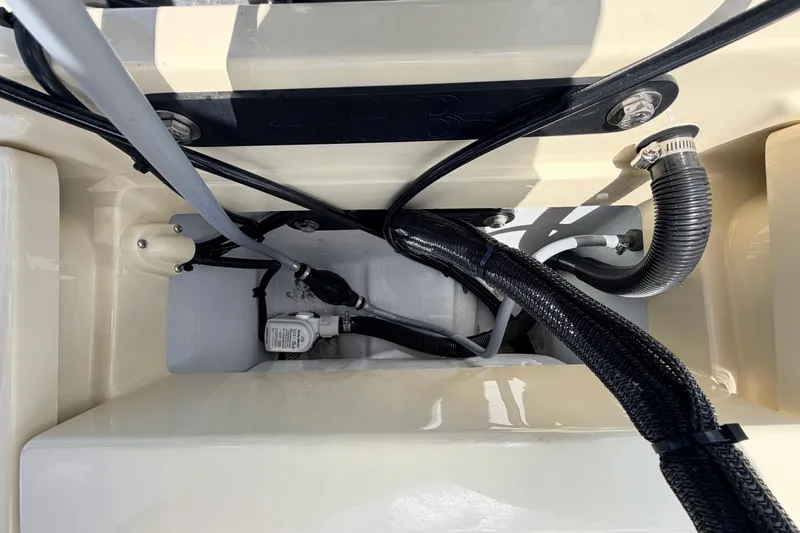 Slide: The Image of Interior view of 2025 Hell's Bay Professional boat showing wiring and components. - 73