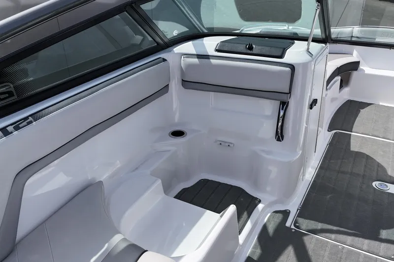 Slide: The Image of 2016 Yamaha Boats 212X interior, featuring sleek seating and modern design elements. - 7