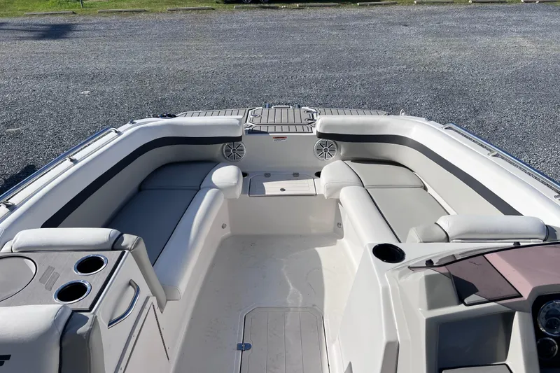 Slide: The Image of 2021 Starcraft SVX 211 OB boat interior with spacious seating and cup holders. - 4