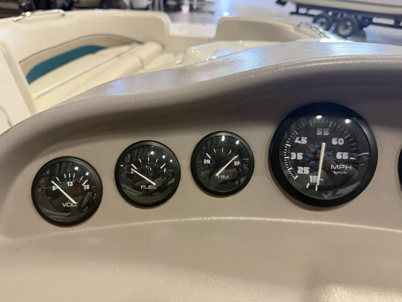 Slide: The Image of Dashboard of a Chaparral 210 Sunesta with various gauges, including speed and fuel. - 26