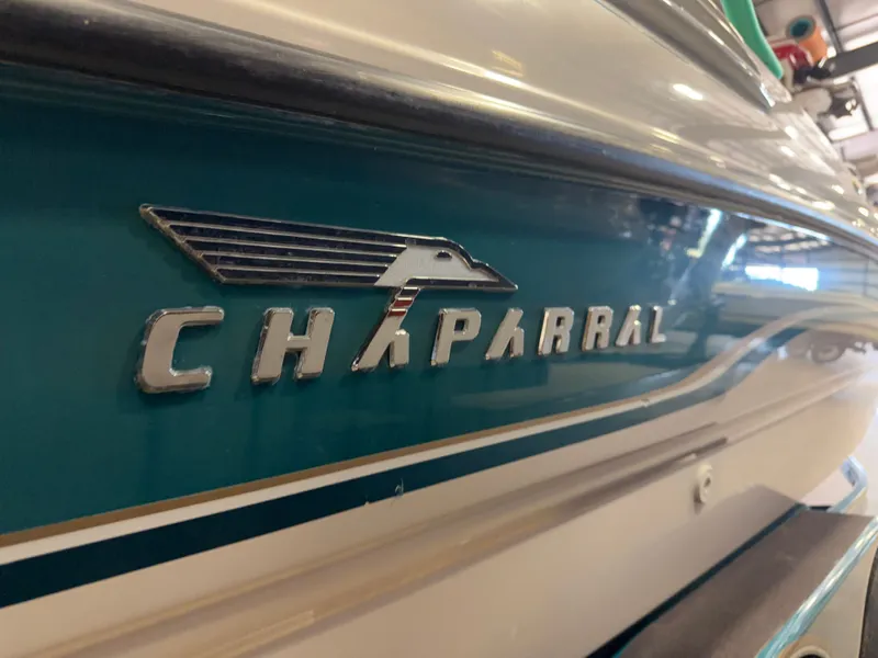 Slide: The Image of Close-up of the 1996 Chaparral 210 Sunesta with the brand logo on the side. - 13