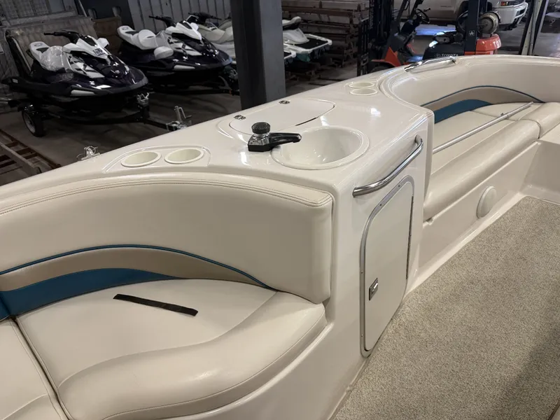 Slide: The Image of Interior view of a 1996 Chaparral 210 Sunesta with seating area and sink. - 30