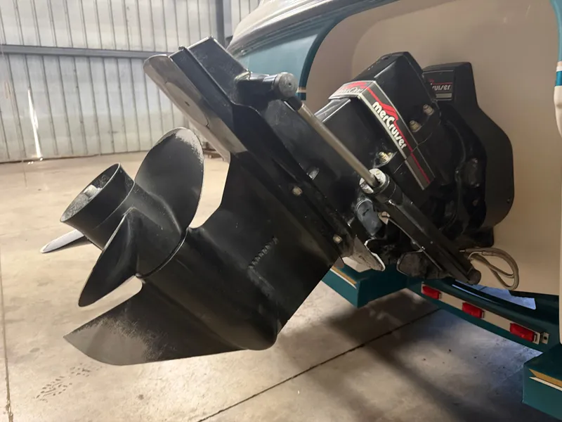 Slide: The Image of Close-up of a boat propeller in a storage facility. - 14