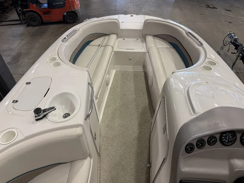 Slide: The Image of Interior view of a Chaparral 210 Sunesta boat with seating and dashboard. - 31