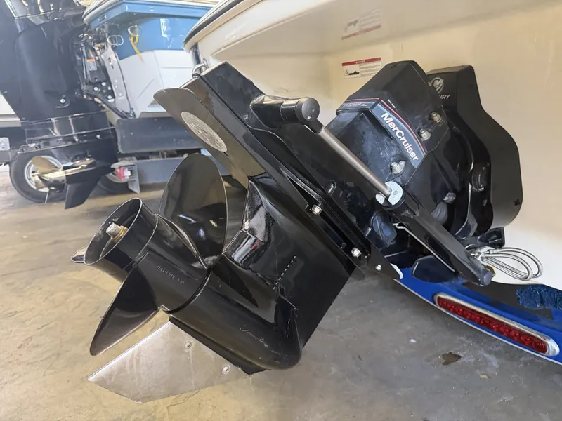 Slide: The Image of Close-up of a boat propeller and drive system in a workshop. - 31