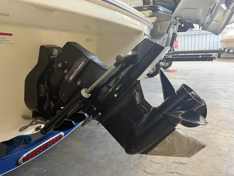 Slide: The Image of Close-up of a MerCruiser drive on a boat in a storage facility. - 32