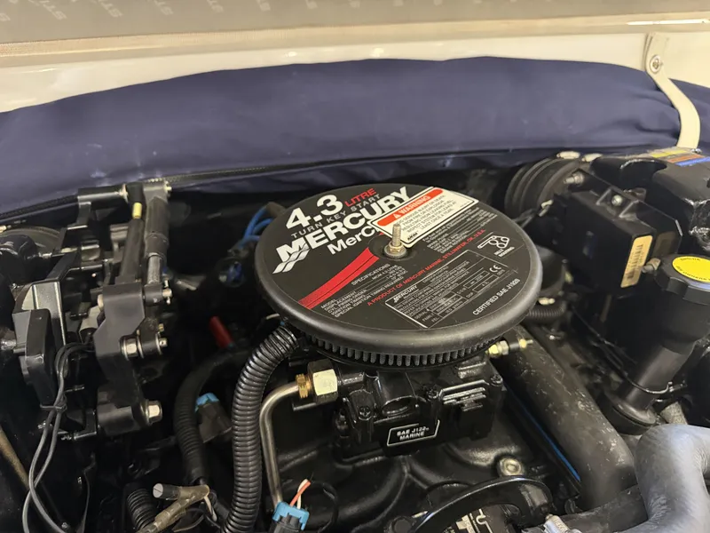 Slide: The Image of A Mercury engine with 4.3-liter capacity in a boat. - 10
