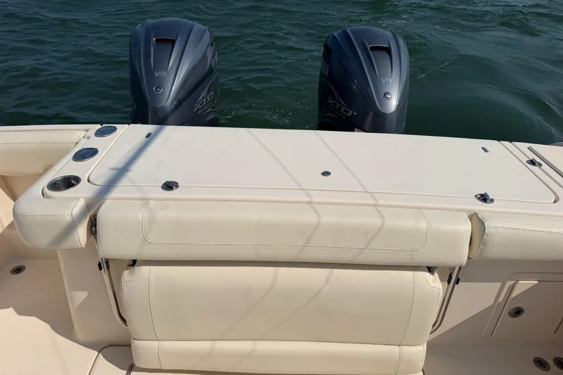 Slide: The Image of 2019 Grady-White Canyon 336 boat with dual Yamaha outboard engines on water. - 63