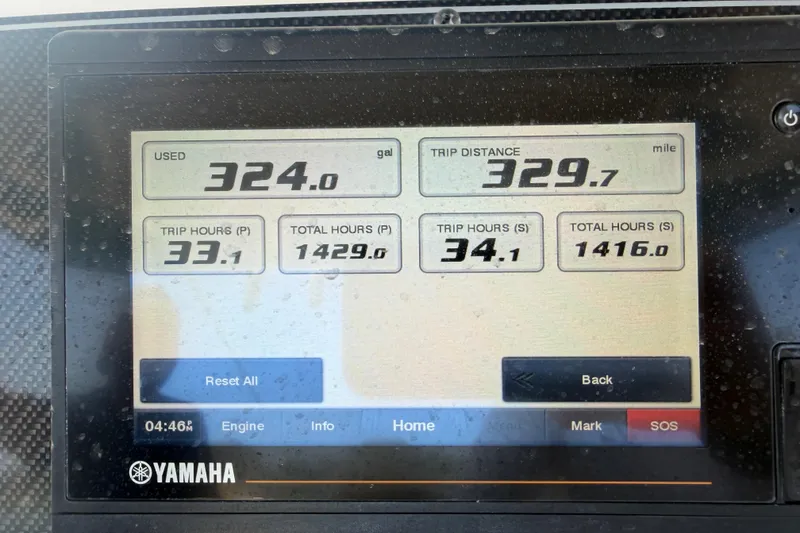 Slide: The Image of Yamaha display showing fuel usage and trip data for 2019 Grady-White Canyon 336 boat. - 47