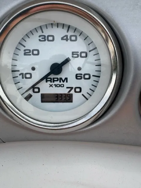 Slide: The Image of A tachometer displays 3339 RPM. It is set in a silver casing. - 17