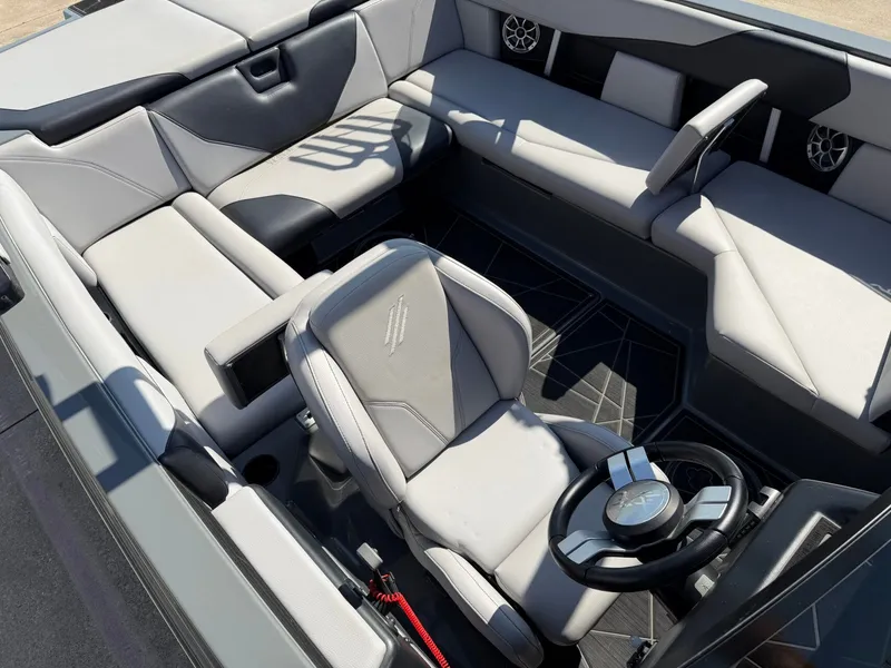 Slide: The Image of Interior of a 2020 ATX Surf Boats 22 Type-S with gray and black seating. - 17
